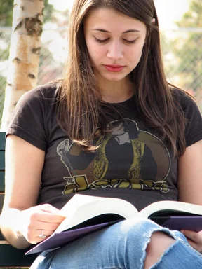Free Stock Photo: Teenage girl reading a book
