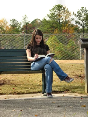 Free Stock Photo: Teenage girl reading a book