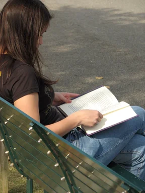 Free Stock Photo: Teenage girl reading a book