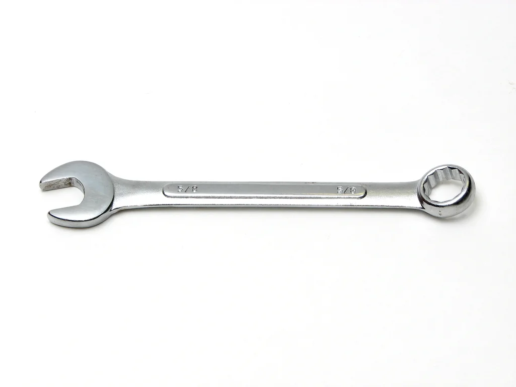 A wrench isolated on a white background : Free Stock Photo