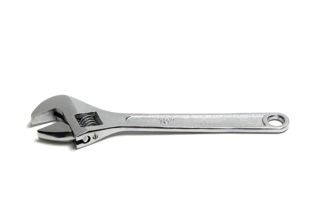 An adjustable wrench isolated on a white background : Free Stock Photo