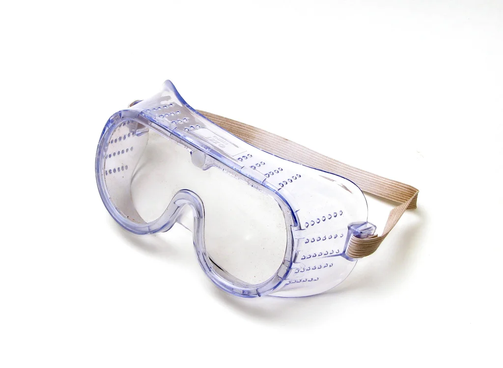 A pair of safety goggles isolated on a white background : Free Stock Photo