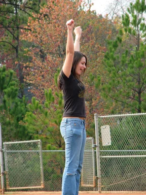 Free Stock Photo: A teenage girl cheering on a field