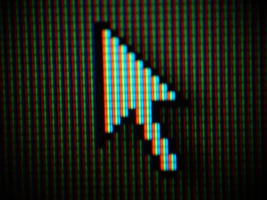 Free Stock Photo: Close-up of a mouse pointer on a computer screen