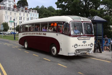 Free Stock Photo: People riding a historic bus