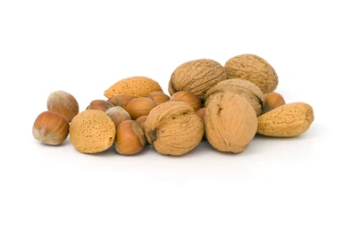 Free Stock Photo: A pile of nuts isolated on a white background