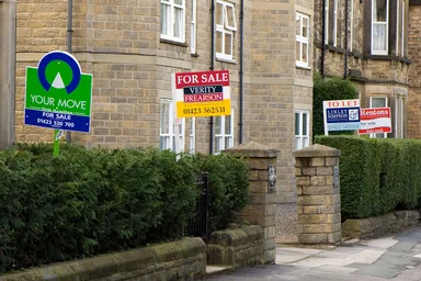 Free Stock Photo: Home sale signs along a street