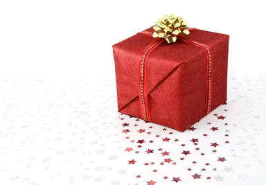 Free Stock Photo: A red Christmas present isolated on a white background