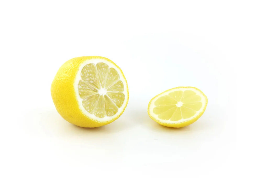 Sliced lemons isolated on a white background : Free Stock Photo