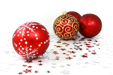 Free Stock Photo: Red Christmas ornaments with silver stars on a white floor