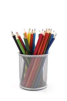 Free Stock Photo: Colored pencils in a pencil holder isolated on a white background