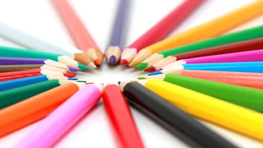 Free Stock Photo: Colored pencils in a circle isolated on a white background