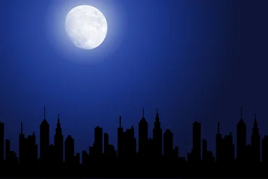 Free Stock Photo: A night cityscape silhouette with the moon
