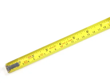 Free Stock Photo: A measuring tape isolated on a white background