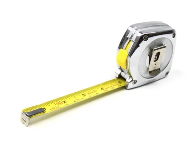Free Stock Photo: A measuring tape isolated on a white background
