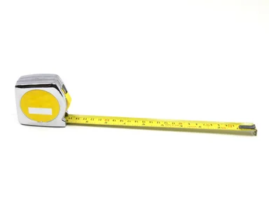 Free Stock Photo: A measuring tape isolated on a white background