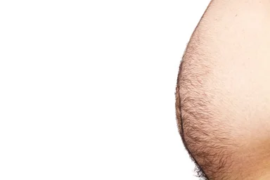 Free Stock Photo: A hairy belly on a white background