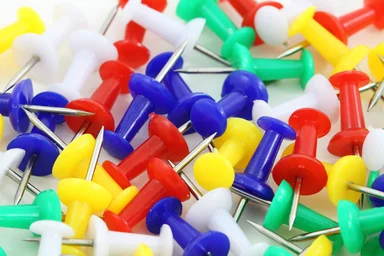 Free Stock Photo: Colorful push pins isolated on a white background