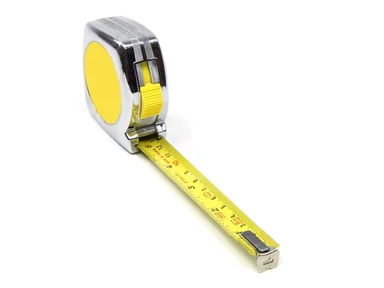 Free Stock Photo: A tape measure isolated on a white background