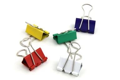 Free Stock Photo: Colorful bind clips isolated on a white background