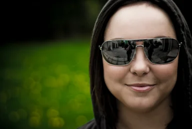 Free Stock Photo: A beautiful woman with sunglasses posing outdoors