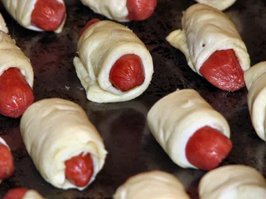 Free Stock Photo: Pigs in a blanket on a cooking sheet