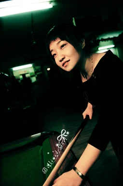 Free Stock Photo: A beautiful Chinese girl playing pool