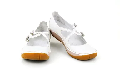 Free Stock Photo: A pair of white shoes isolated on a white background