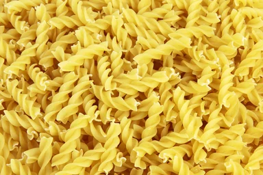 Free Stock Photo: Uncooked dry yellow fusilli pasta