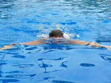 Free Stock Photo: A man swimming in a pool