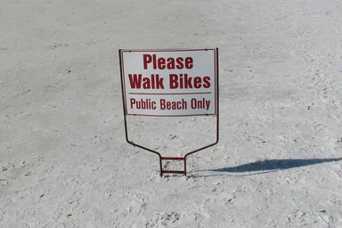 Free Stock Photo: A bike sign on the beach