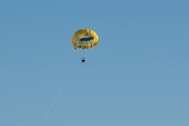 Free Stock Photo: A couple parasailing in the sky
