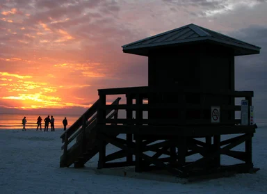 Free Stock Photo: A lifeguard station on the beach at sunset
