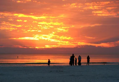 Free Stock Photo: People watching the sunset on a beach